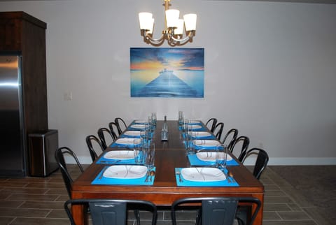 Enjoying dining together with seating for 16 inside and 6 more on the patio