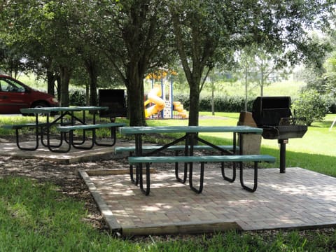 Outdoor BBQ areas scattered on property
