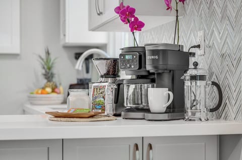 Everything you need to start your morning...Keurig Duo Single Serve & Carafe Coffee Maker, French press, coffee bean grinder, electric kettle for tea. Bring your k-pods or use our Maui brew coffee.