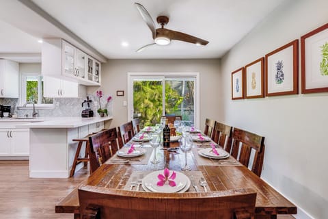 Indoor dining table for 8 plus 2 highchairs and booster chairs provided.  Plenty of dishes for all the place settings, wine glasses, flutes, and more.  Enjoy family-style meals inside or outsi