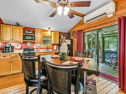 Bar height dining table. Hope you like roosters!