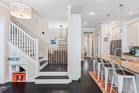Entrance at far end to first floor bedroom and bath for family