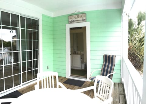 A door to the bathroom from the deck, makes those pool time bathroom breaks easy