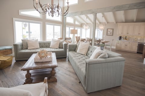 Enjoy stunning beach and ocean views from the living area, a wall of windows.  