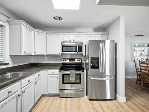 Brand new refrigerator with french doors and bottom freezer