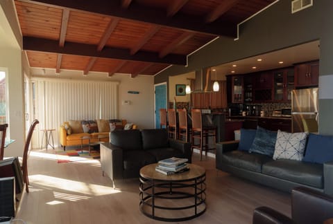 Living room with view of blue front entrance door