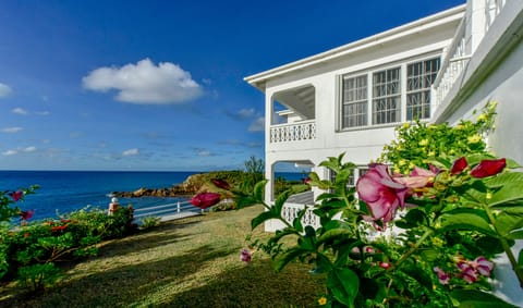 Eastern view of the house with garden bloom and ocean view