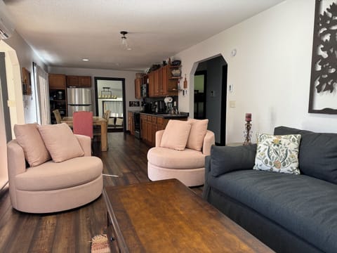 Sofa sleeper and two turning sofa chairs. Upper living space with Sofa sleeper