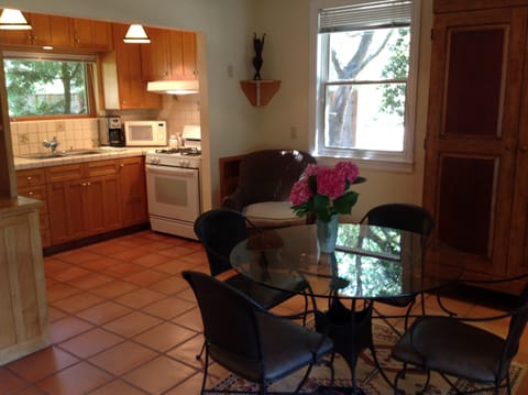 Full Kitchen with Satilla tile floors and dining area.
