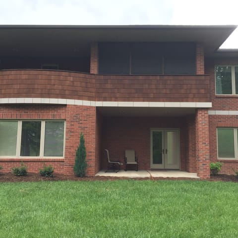 Outside of porch & balcony off upper & lower level family rooms