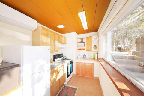 Toaster, coffee pot, blender, pots/pans, dishes & glassware. 
