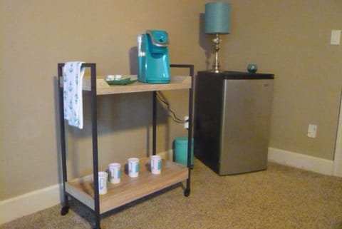 Coffee cart and mini 'fridge in bonus room.