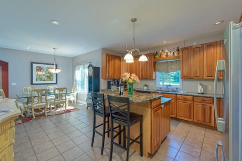 The granite center island and cooktop make meal prepping easy and convenient!