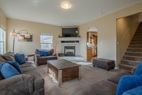 Cozy living room with fireplace and ample seating for gatherings