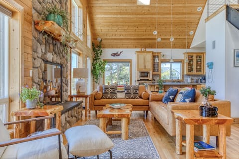 The leather couches and easy chair are contemporary and comfortable