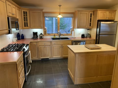 Kitchen- Center of house- flows into dining and living room 