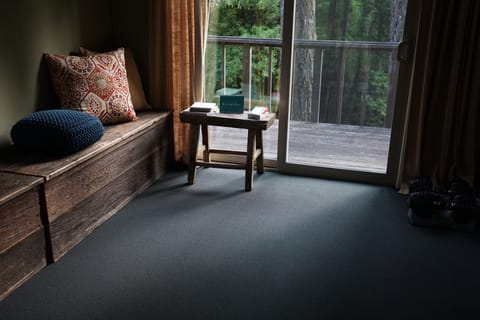 Yoga studio has gym & yoga equipment, plus space for an air mattress