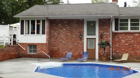 has a fence and gate not shown in this picture.