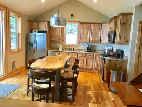 Spacious kitchen with gathering table