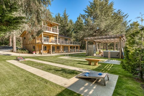 Beach Cabin has custom outdoor game courts for corn hole, and ladder golf