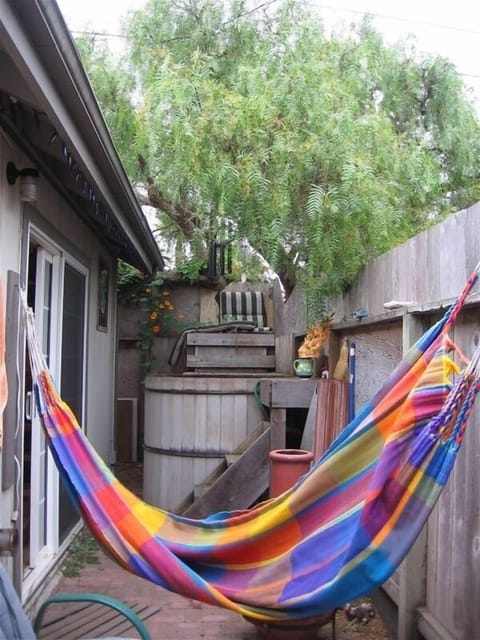 Relax in a hammock under the pepper tree, listening to wind chimes