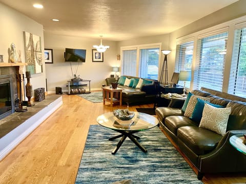 30 ft. living room has 3 couches and room for groups.