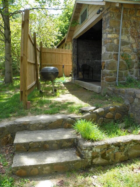 Private, sheltered outdoor hottub just steps out your back door, charcoal grill.