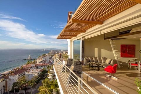 Lounge inside and out on a big open  (and private) balcony with incredible views in all directions.