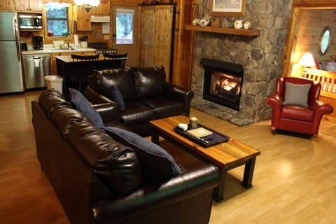 Cozy up around the gas fireplace in the winter.