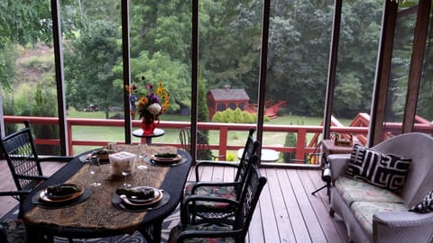 Screen porch, looking down to the gazebo and the creek.
