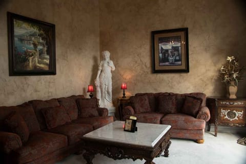 Sitting Room Main Level w. 7 foot-tall Italian Marble Statute.
