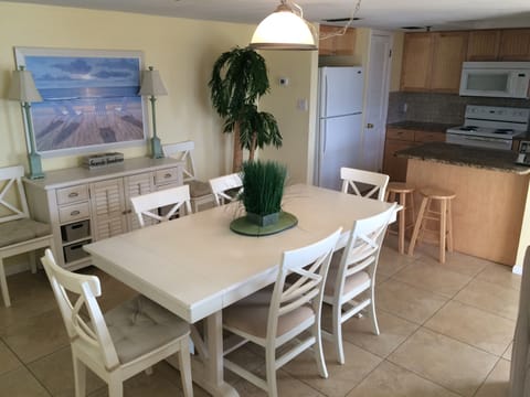 Dining table seats 6, or can seat 8 with the table expanded.