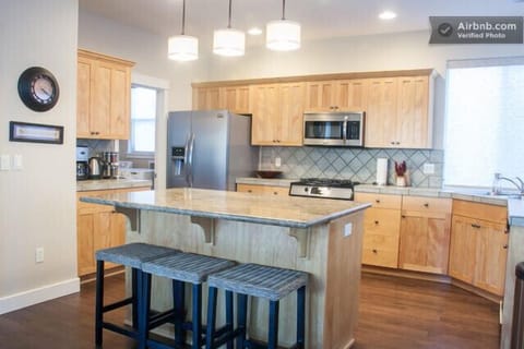 Open kitchen flows into great room for gracious entertaining