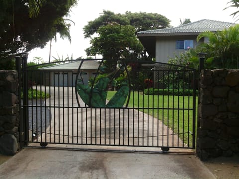 Our estate offers complete privacy with its lava rock wall and gated entry.  