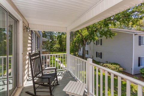 Covered porch - we've added a patio set and installed a ceiling fan too