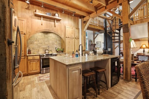 SS appliances, Granite island, Reverse Osmosis faucet next to farmer's sink