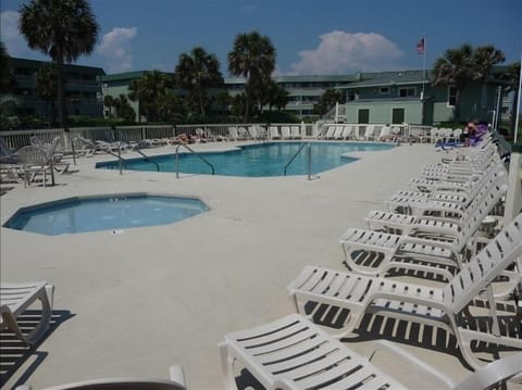 Oceanfront pool area with childrens pool and sunbathing deck