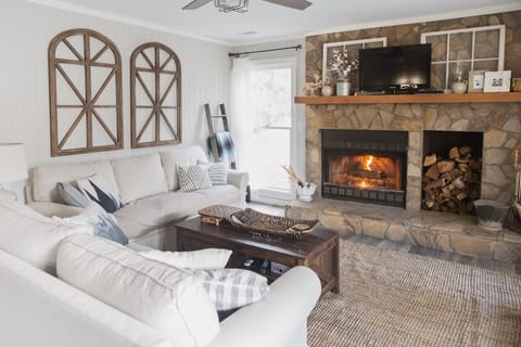 Cozy living room for relaxing by the fireplace or watching a movie