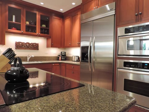 African Mahogany Cabinetry accented with beautiful granite countertops.
