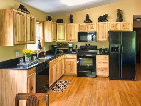 Cedar Cabinets with Granite and Modern Appliances.
