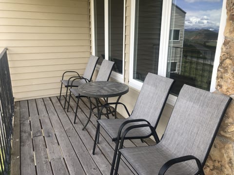 Enjoy coffee or drinks on the balcony at Mountainside 67.