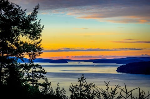 Beautiful sunset water view from our NEW larger deck  