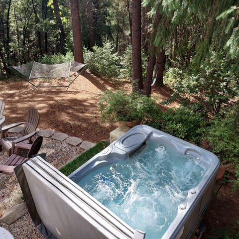 Private spa overlooking the woods