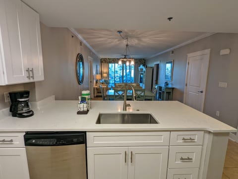 Kitchen & Dining Area: Modern kitchen with sleek finishes, perfect for culinary adventures!