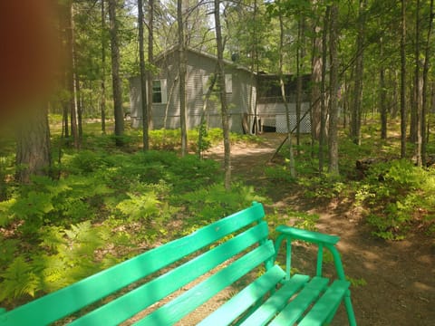 View of house from glider by lakeshore