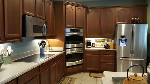 Treat yourself with modern stainless steel appliances, Wolf flattop, double oven