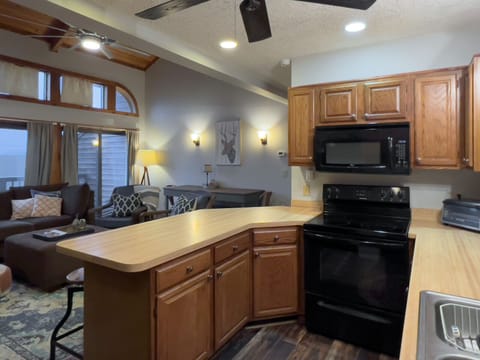 Updated appliances including microwave, toaster oven, and Keurig