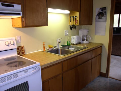 The kitchen is small but has everything you need without the clutter.