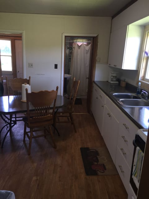 Kitchen with all the dishes,utensils, coffee maker, toaster, microwave etc. 