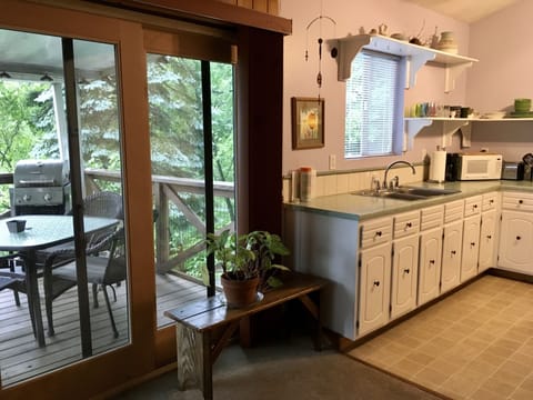 Deck and kitchen.  Enjoy outdoor dining!